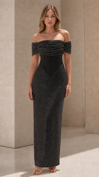Front view of black glitter off-shoulder corset maxi dress