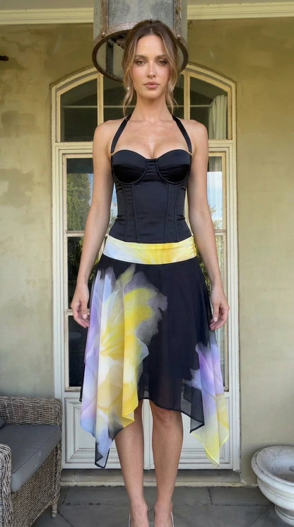 Front view of black halter corset top with watercolor skirt