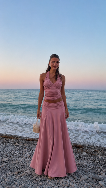 Front view of dusty rose ruched halter top and maxi skirt matching set