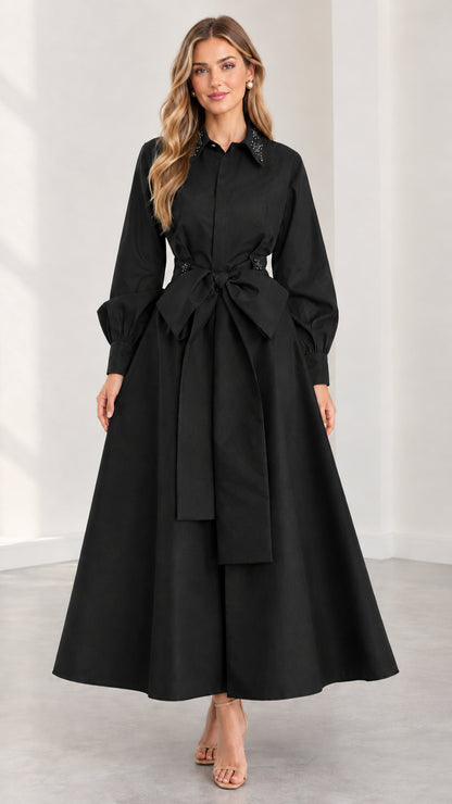 Model wearing black embellished collar maxi shirt dress with tie belt