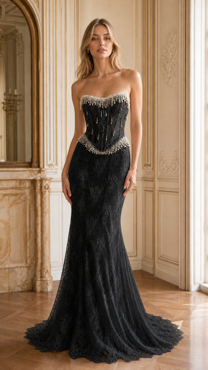 Front full-length view of black strapless pearl beaded corset lace mermaid gown