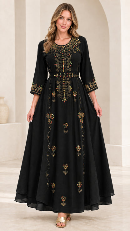 Front full-length view of woman wearing Black embroidered beaded maxi dress