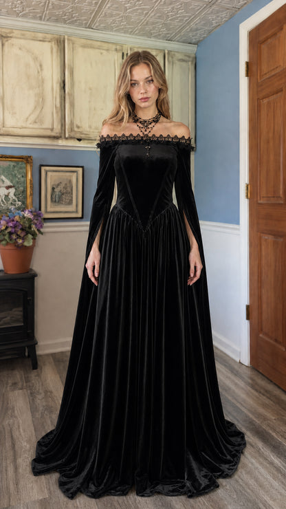 Model wearing Black velvet off-shoulder maxi dress