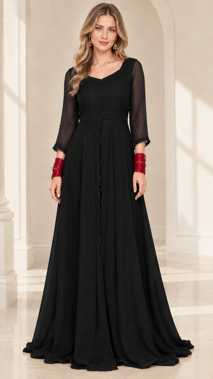 Front view of model wearing black chiffon embroidered maxi evening dress