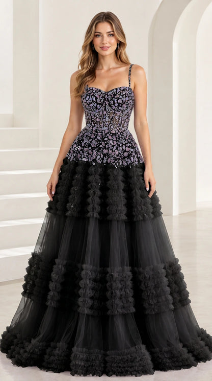 Front view of Black beaded corset tiered tulle formal gown