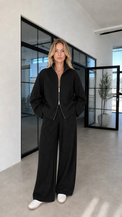 Woman wearing black lounge set