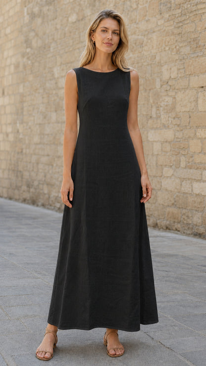 Woman wearing black sleeveless maxi dress