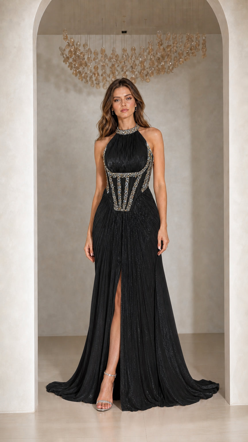 Front view of woman wearing Black pleated halter corset evening gown