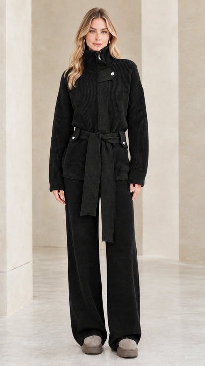 Full-length front view of the ribbed knit sweater and wide-leg pants set in classic black