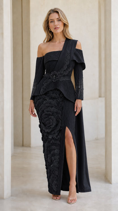 Front full view of black evening gown with dimensional skirt texture