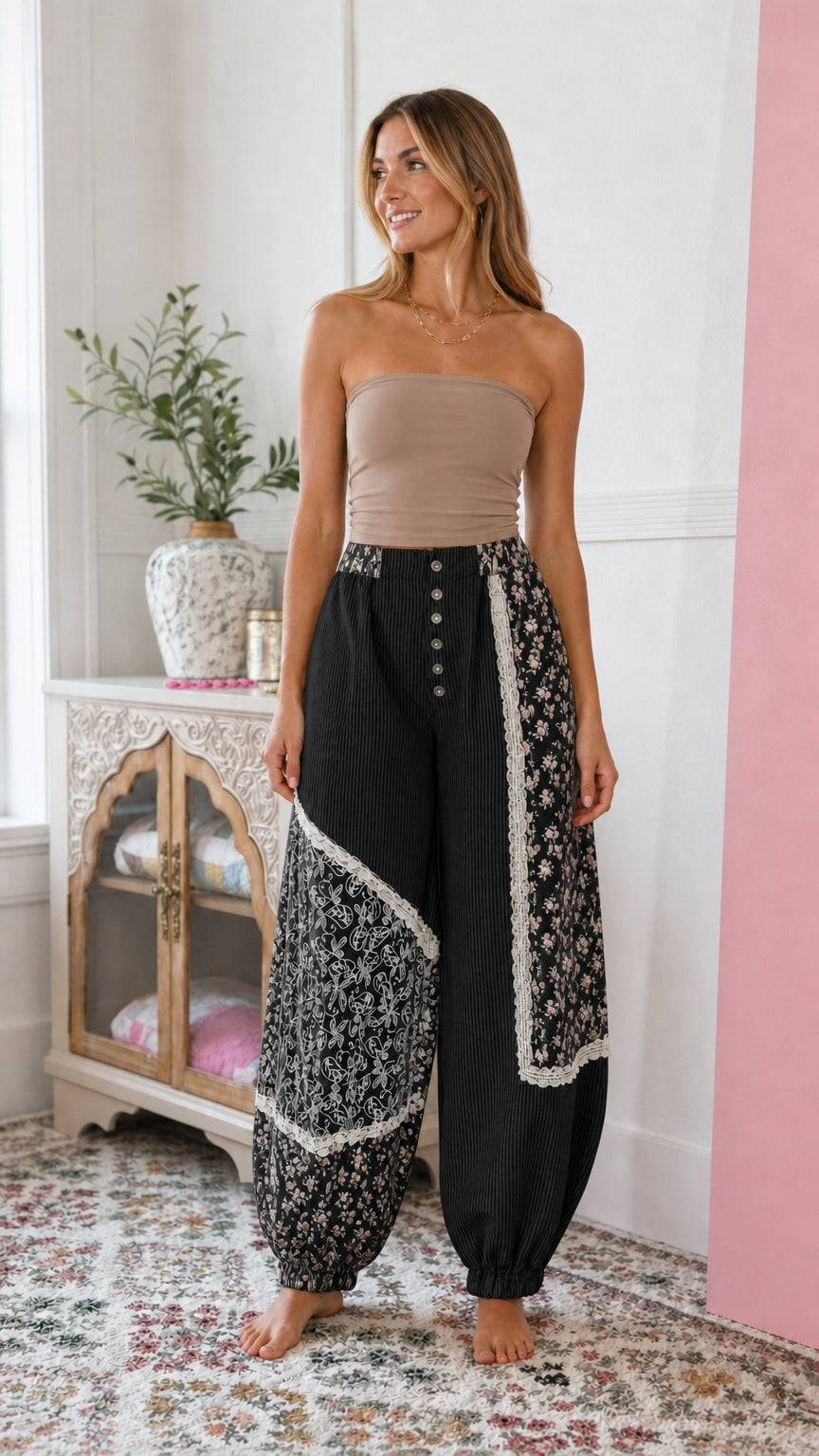 Black floral patchwork harem pants with lace trim on model