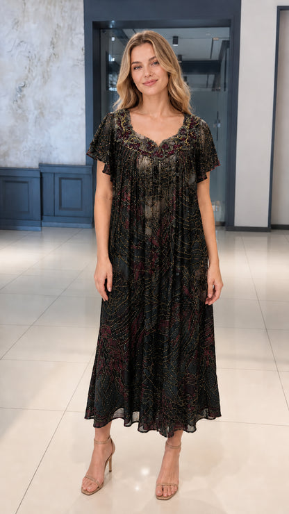 Front view of black and charcoal printed pleated midi dress