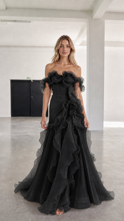 Front view of black off-shoulder ruffled tulle evening gown