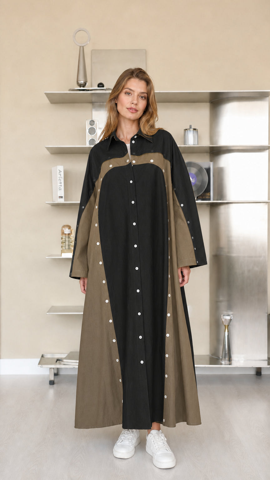 Front view of woman wearing black and olive colorblock maxi shirt dress
