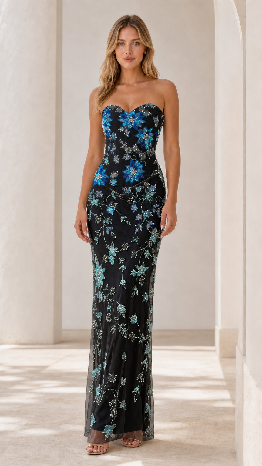 Front view of black strapless evening dress with blue floral beadwork