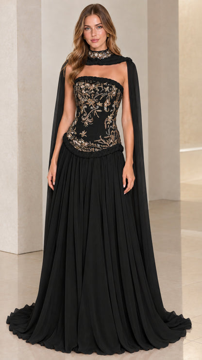 Black strapless embroidered corset evening gown with matching black sheer cape