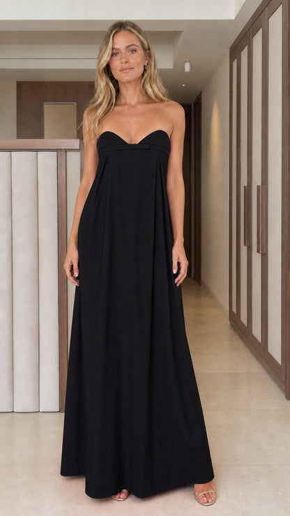 Front full view of classic black strapless bow detail maxi dress