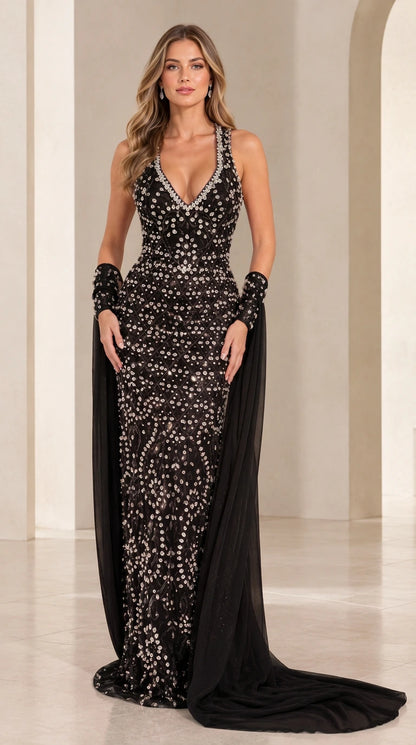 Black crystal-embellished V-neck evening gown with matching cape cuffs