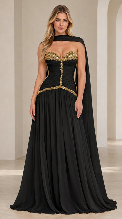 Model wearing black strapless embellished corset chiffon evening gown with matching neck scarf
