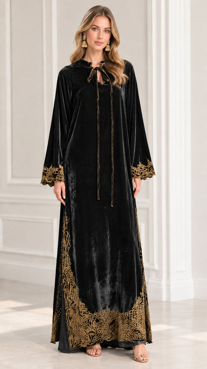 Full front view of model wearing Classic Black embroidered velvet kaftan dress