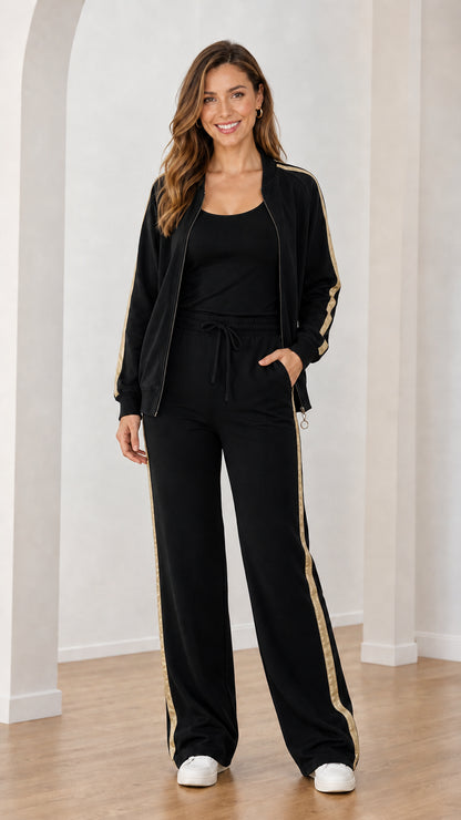 Front view of black 3-piece tracksuit set with gold metallic stripe