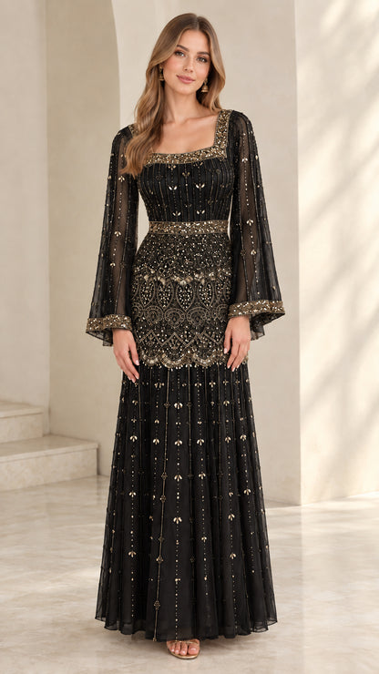 Model wearing black embellished square neck maxi dress with bell sleeves