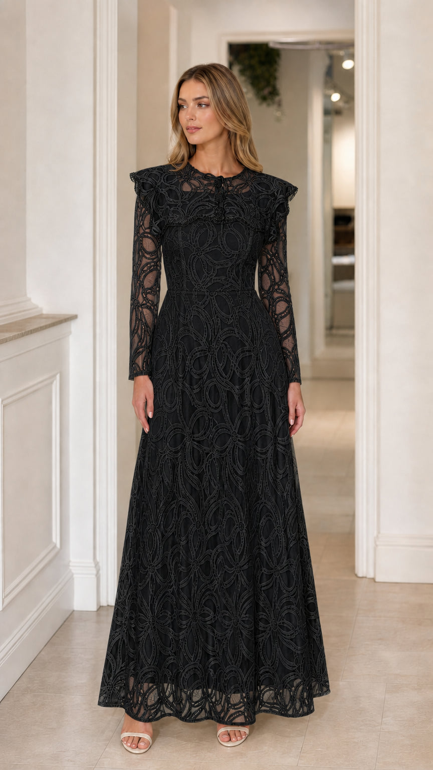 Front view of the Black Lace Capelet Maxi Dress