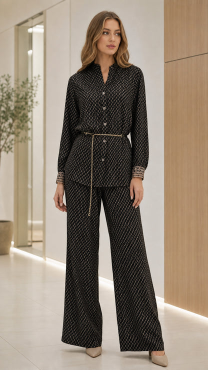 Model wearing black geometric print matching set