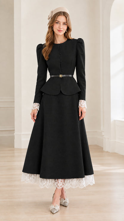 Front view of woman wearing black vintage peplum jacket and lace hem maxi skirt set
