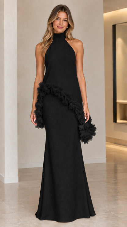 Front view of black halter high-neck column maxi dress with tonal 3D ruffle trim