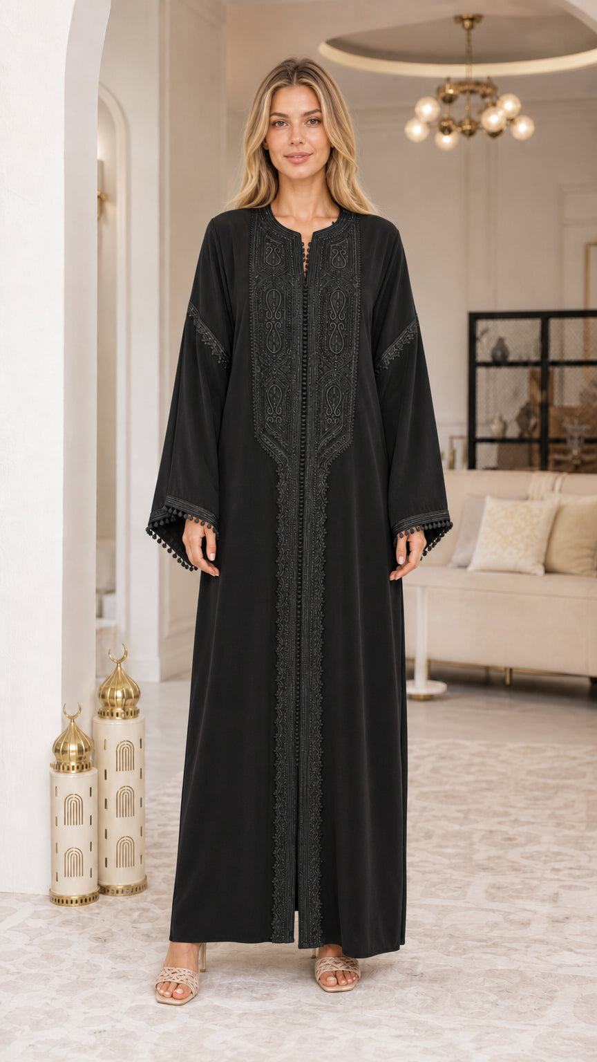 Model wearing Black embroidered long sleeve kaftan dress