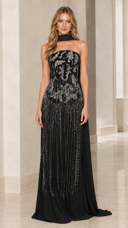 Model wearing black strapless beaded evening gown with matching neck scarf