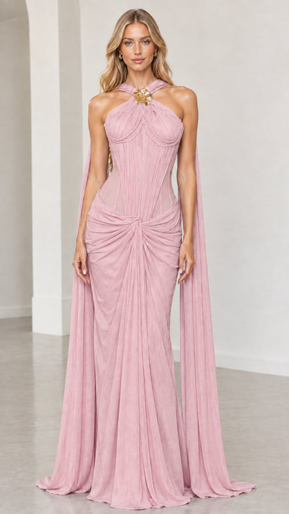 Front view of blush pink halter corset draped formal maxi gown
