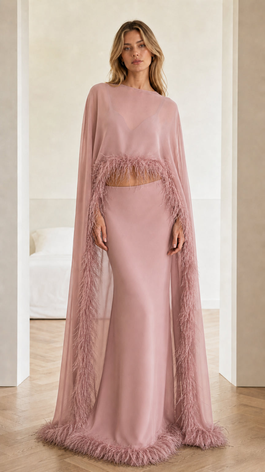 Full-length view of dusty pink feather-trim cape and skirt evening set
