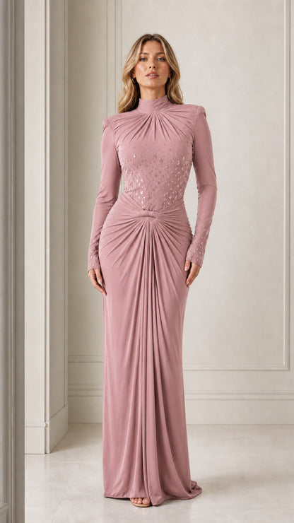 Model wearing the long-sleeve mock neck draped maxi evening gown in dusty pink