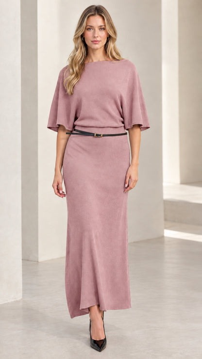 Front view of woman wearing dusty rose pink belted knit maxi dress