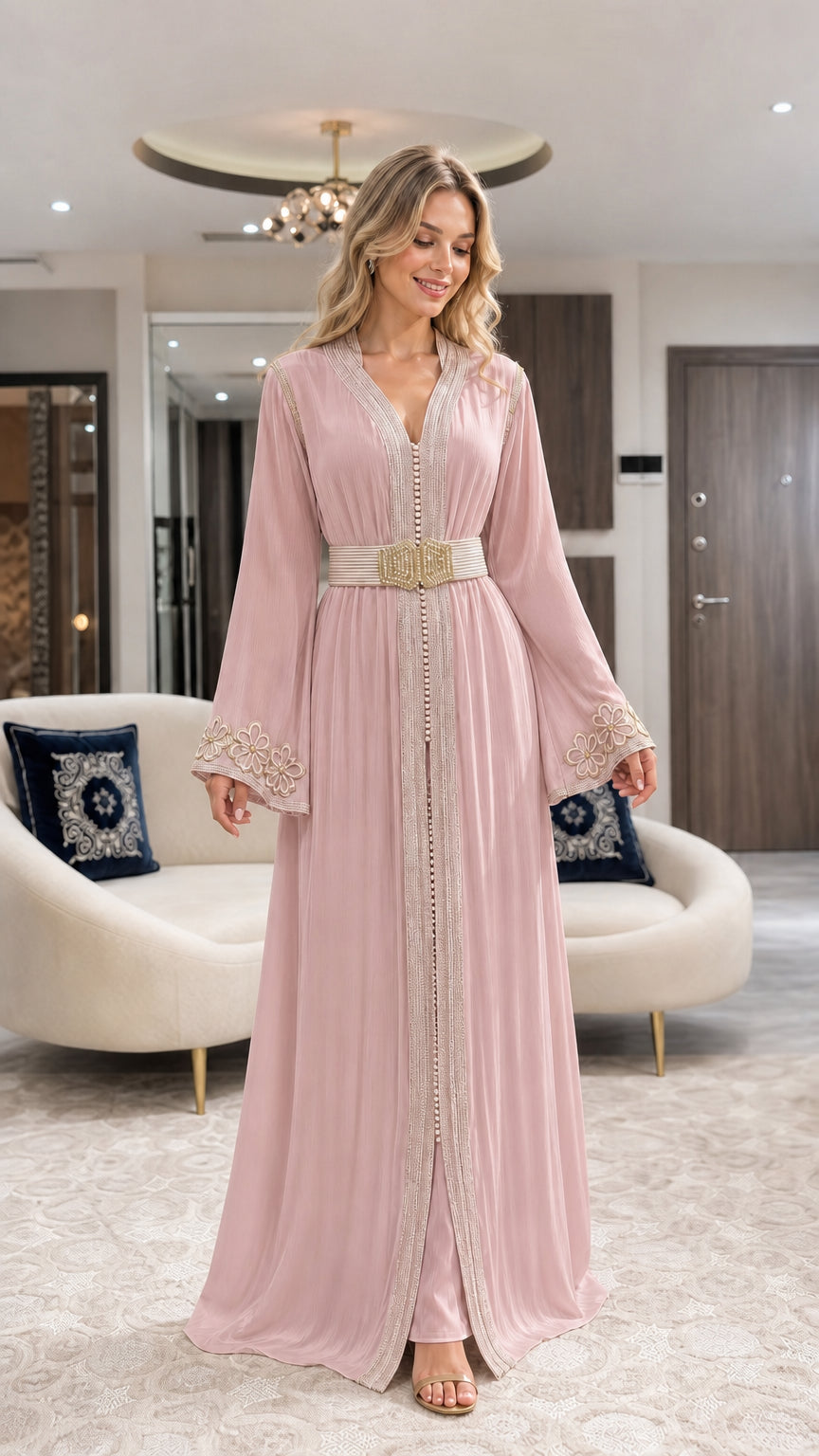 Front view of dusty pink pleated modest caftan dress with belt