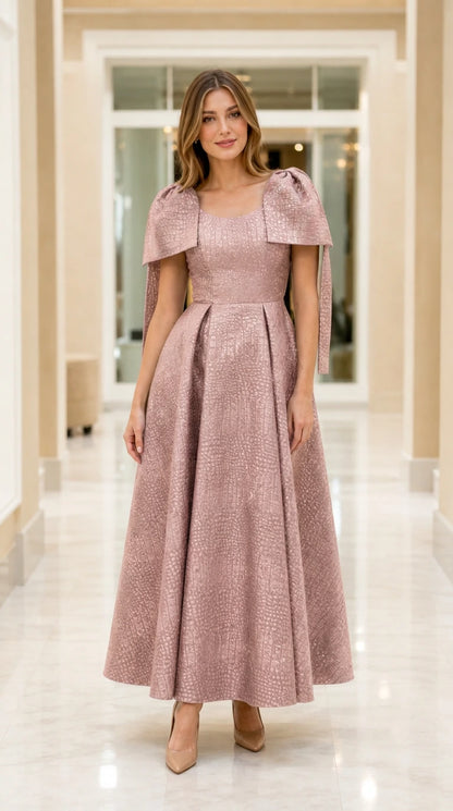 Full-length view of model wearing Dusty Rose capelet jacquard maxi evening dress