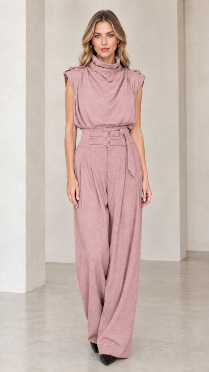 Model wearing dusty pink sleeveless drape high neck wide leg jumpsuit