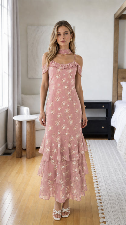 Model wearing pink floral print choker neck tiered ruffle midi dress