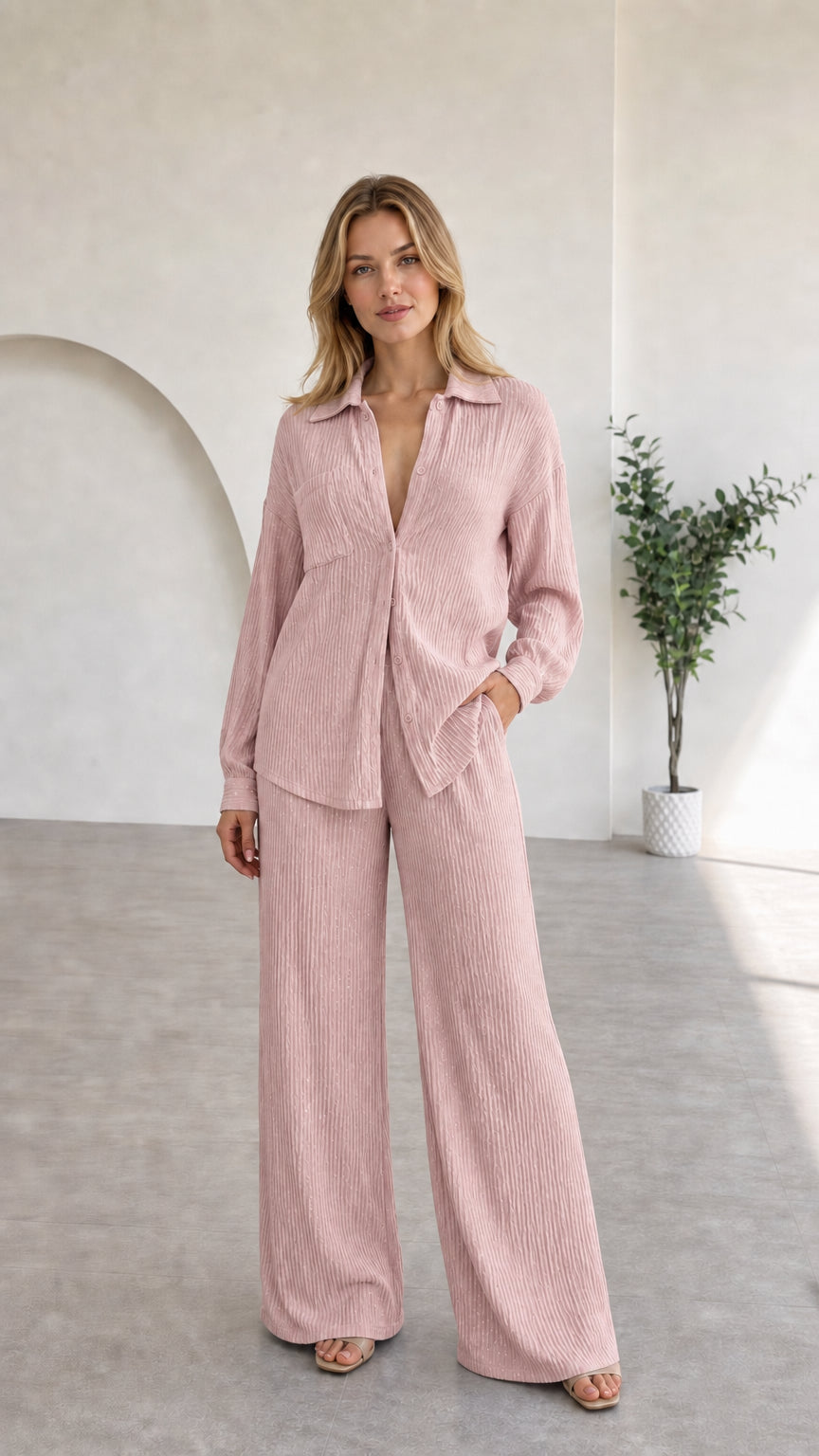 Full view of model in dusty pink textured two-piece lounge set