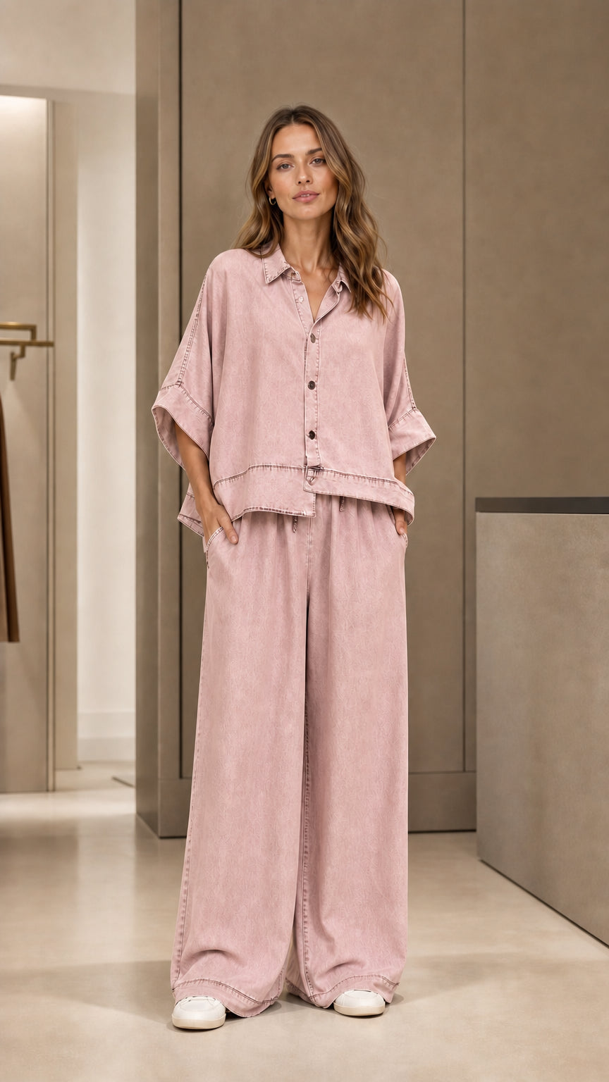 Full front view of model wearing pink two-piece pants set