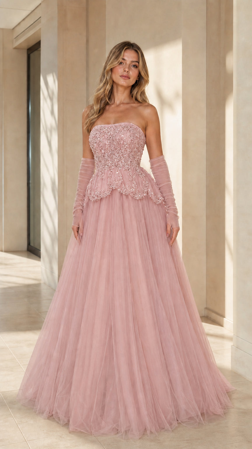 Full-length front view of the strapless beaded tulle ballgown in dusty pink