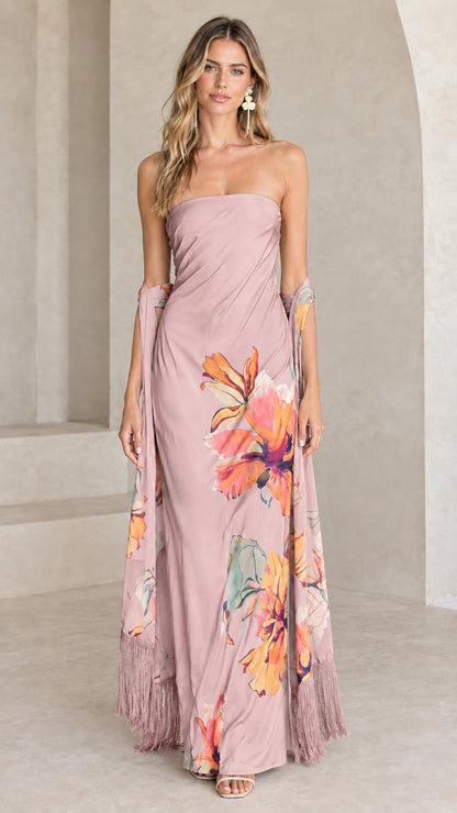 Dusty pink floral strapless maxi dress paired with coordinating fringed wrap