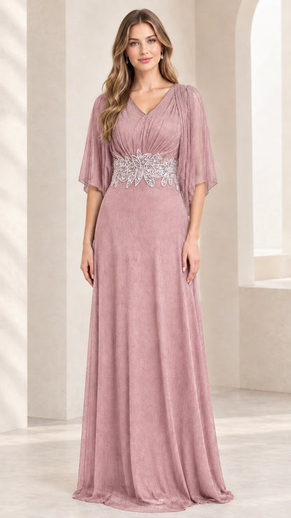 Model wearing dusty rose mauve flutter sleeve evening gown with beaded waist accent