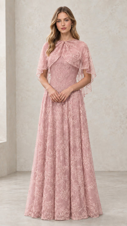 Woman wearing Dusty Rose embroidered lace capelet evening dress