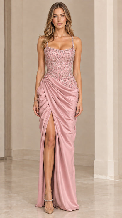Model wearing dusty pink embellished corset evening gown