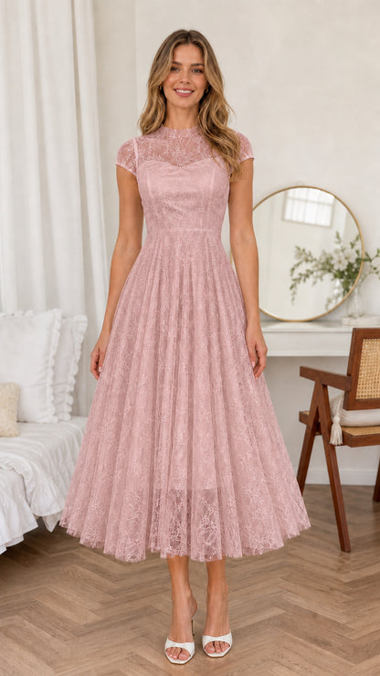 Front view of woman wearing Blush Pink illusion neck lace midi dress