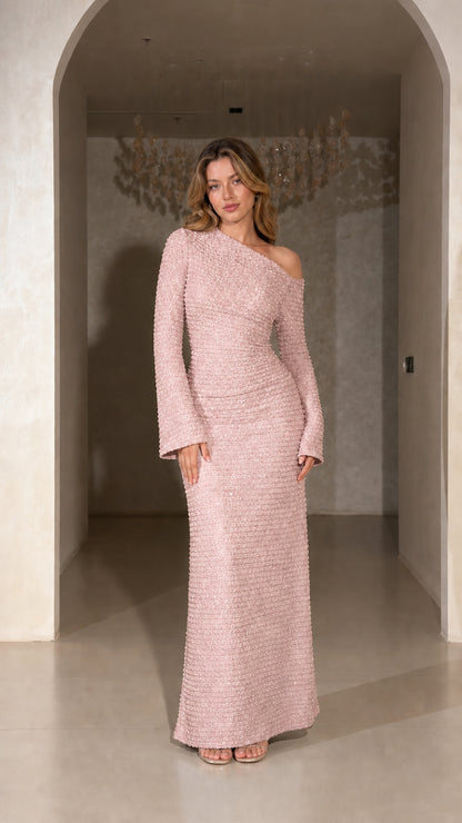 Model wearing Blush Pink one-shoulder long sleeve textured column gown