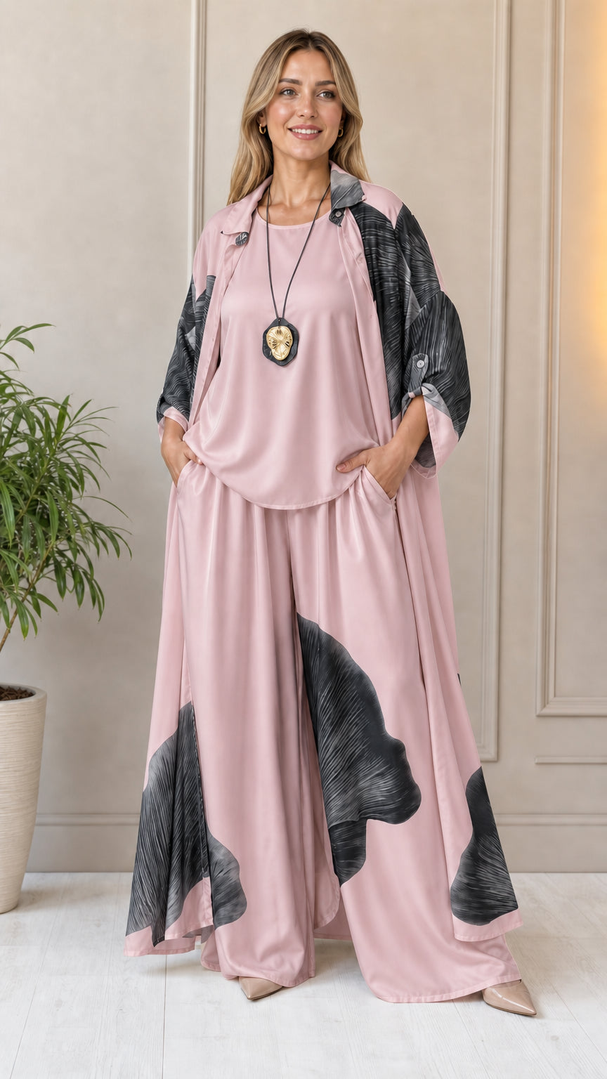 Woman wearing pink abstract print 3-piece set